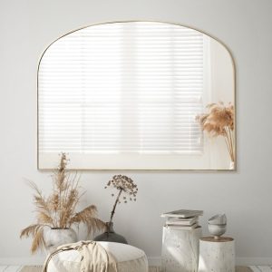 מראה חצי עגולה בצבע זהב